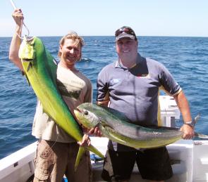 Steve Duffy, left, and Andrew Turner with a couple of mighty mahi mahi caught off the Fisheries FAD.